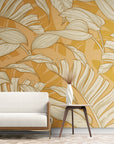 Papier peint tropical - Feuilles tropicales beiges sur fond orange