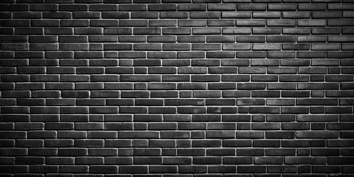 Brick-effect behang - Zwarte matte bakstenenmuur