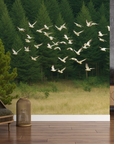 Papier peint animaux - envolée d'oiseaux sur la forêt