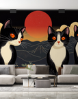 Papier peint animaux - trois chats noirs devant une lune rouge