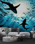 Papier peint animaux - silhouettes de requins sous l'océan