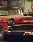 Papier peint voitures - voiture ancienne devant un garage