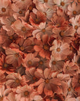 Floral wallpaper – orange flowers in a dense composition